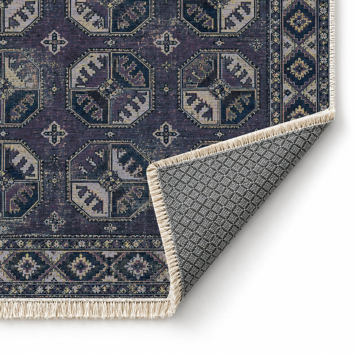 Ersari Gul Mineral Blue washable rug folded corner showing the backing