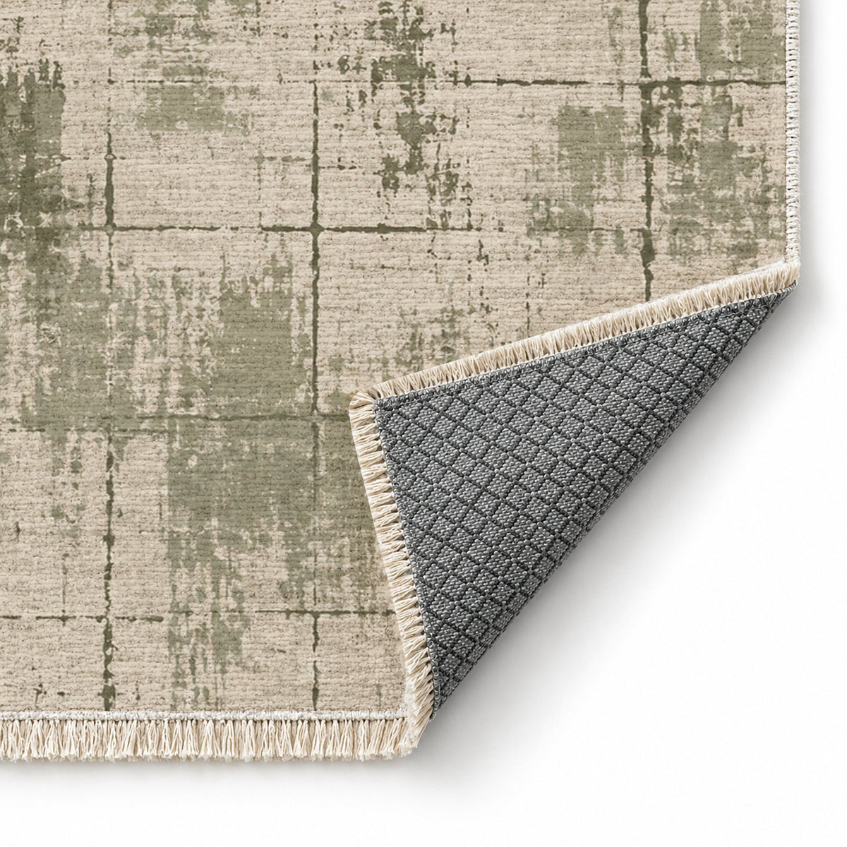 Faded Grid Ivory & Sage washable rug folded corner showing the backing
