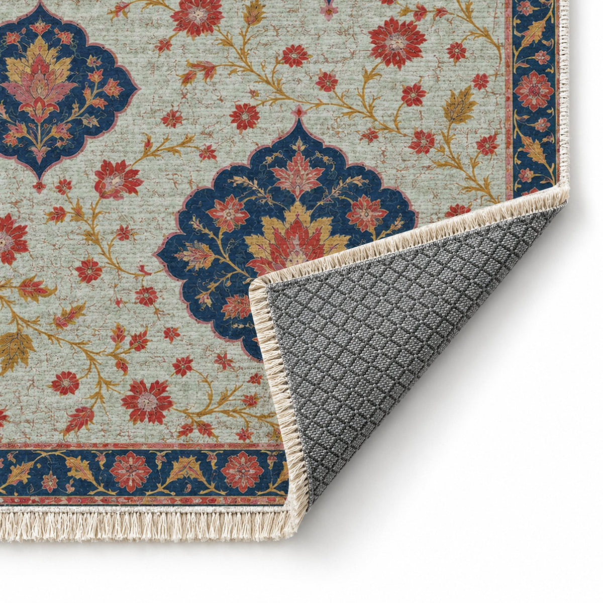 Floating Blossom Shields Glacier, Ink & Vermilion washable rug folded corner showing the backing