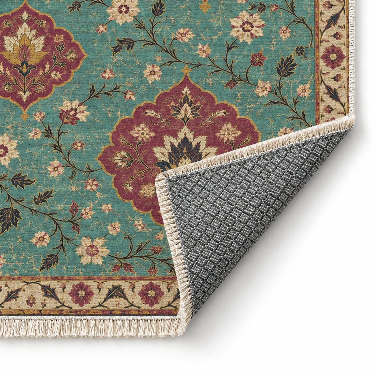 Floating Blossom Shields Lagoon & Berry washable rug folded corner showing the backing