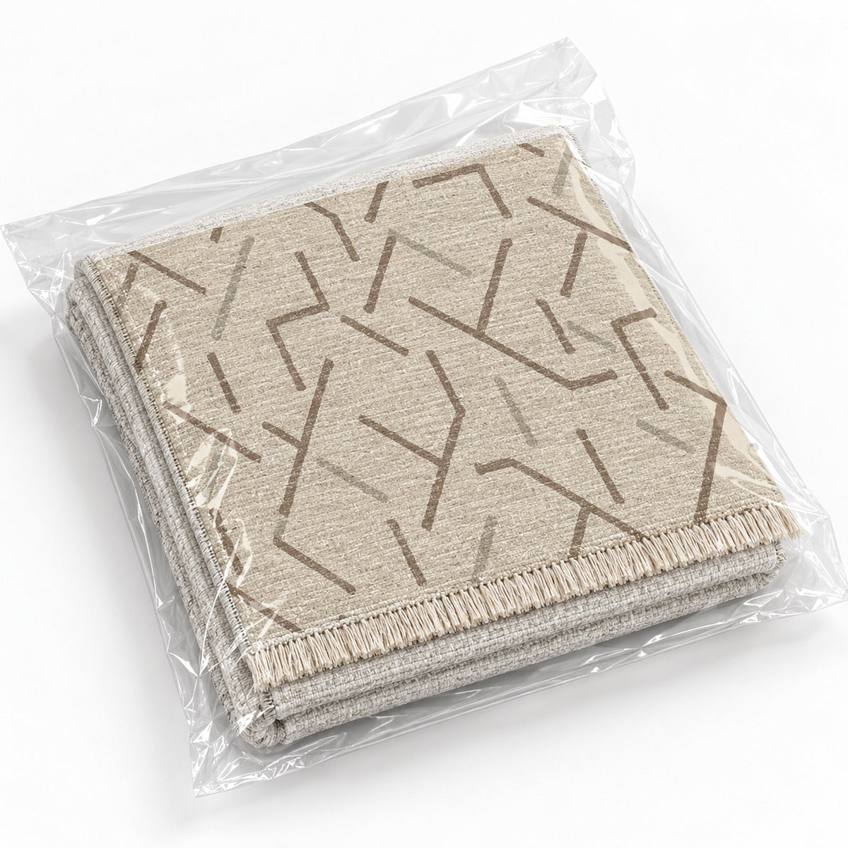Fragment Geometry Ivory & Taupe washable rug rolled and packaged