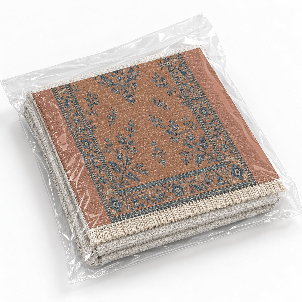 Garden Medallion Clay & Denim washable rug rolled and packaged