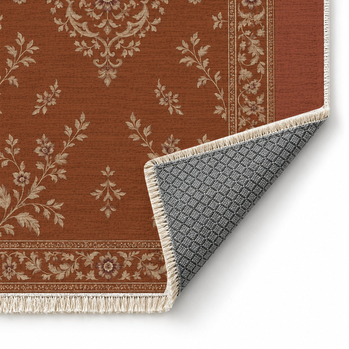 Garden Medallion Rust & Sand washable rug folded corner showing the backing