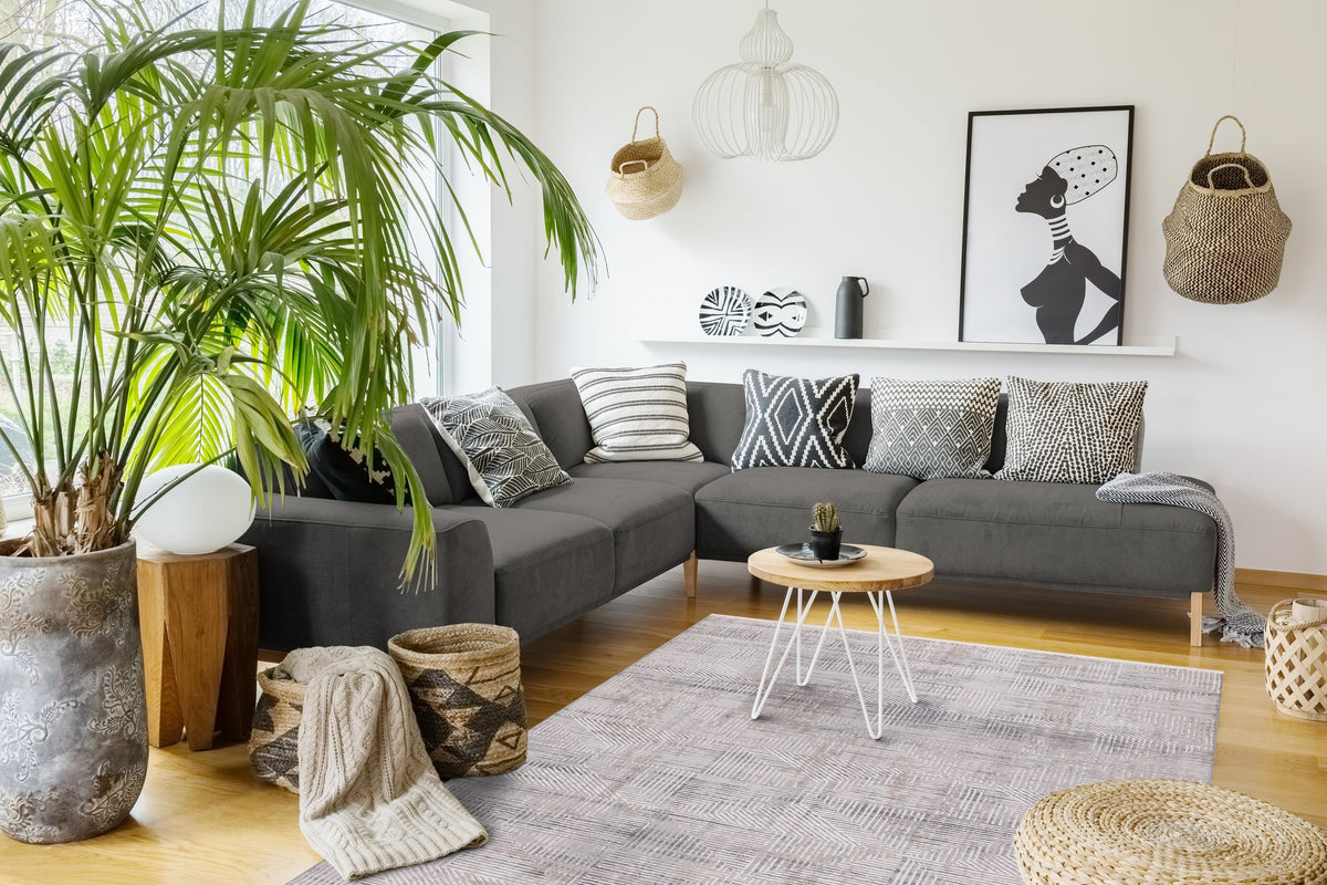 Grey & Ivory Distressed Abstract Area Rug in a living room