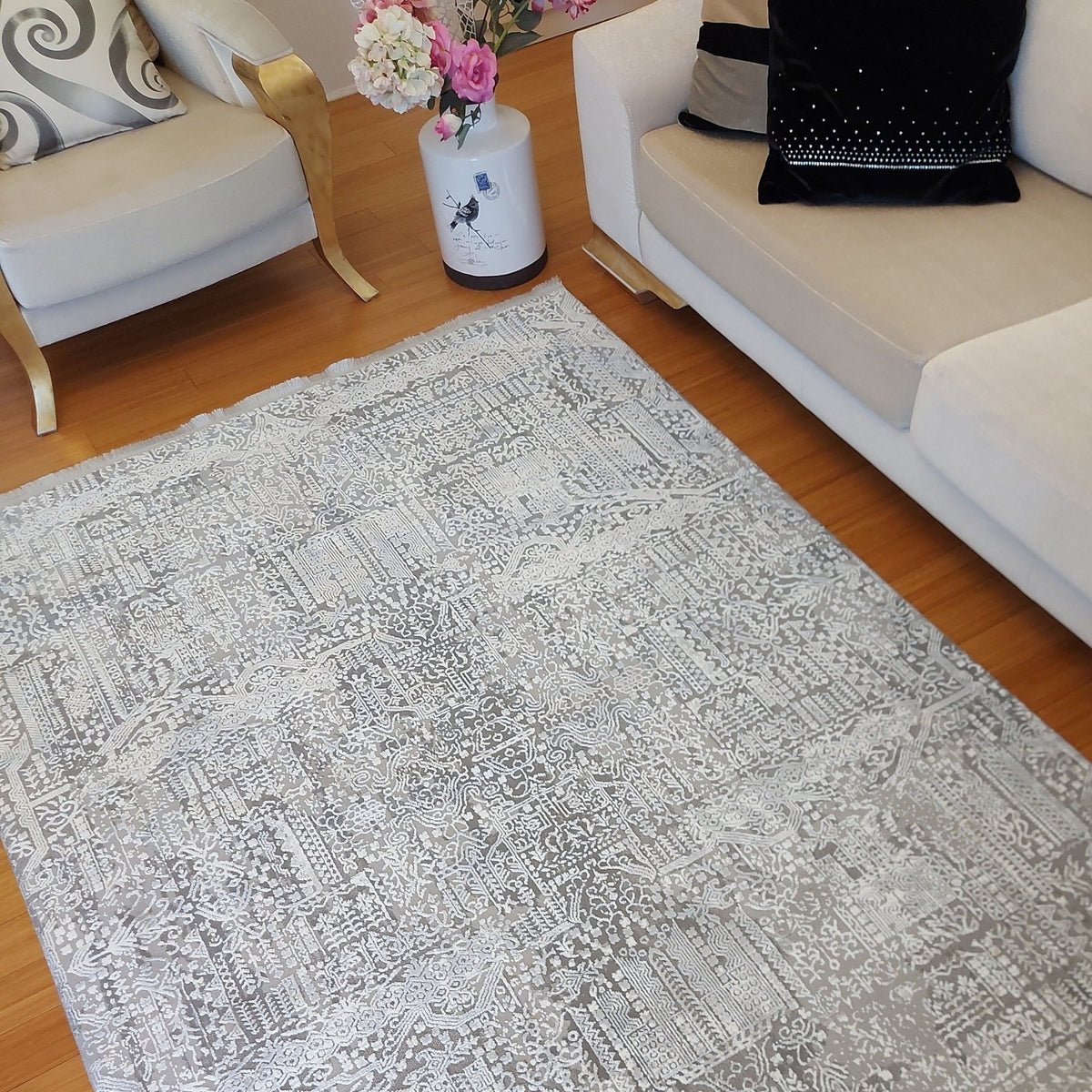 Grey Distressed Abstract Area Rug in a living room