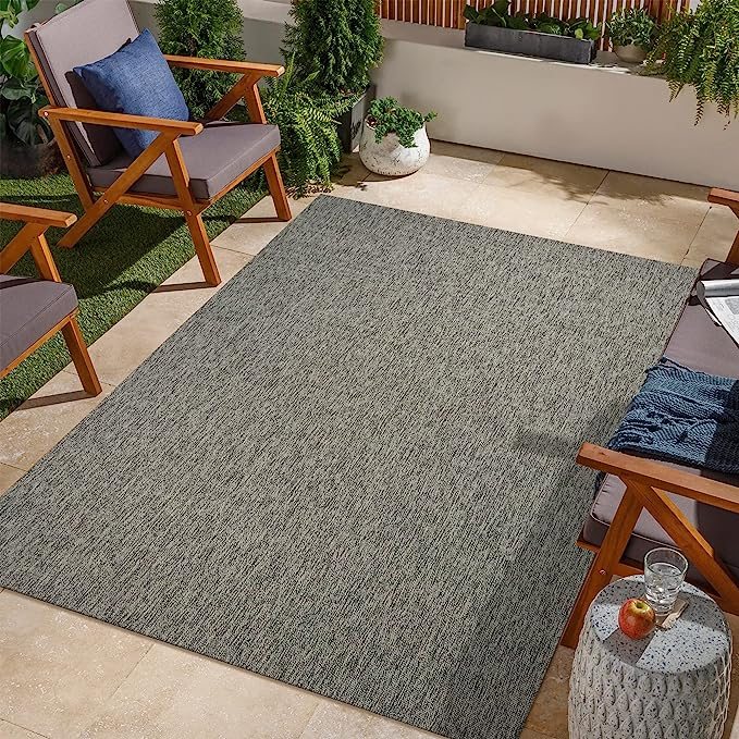 Grey Textured Flatweave Indoor Outdoor Rug in a living room
