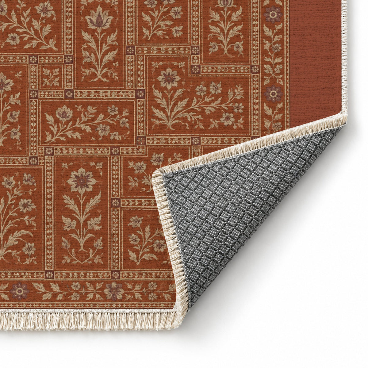 Heritage Tiles Rust & Sand washable rug folded corner showing the backing