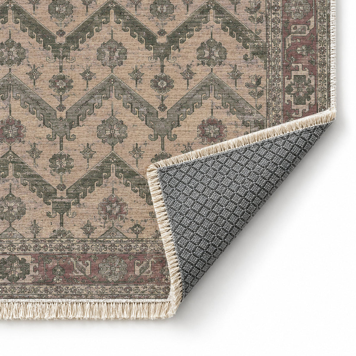 Hooked Chevron Graphite & Linen washable rug folded corner showing the backing