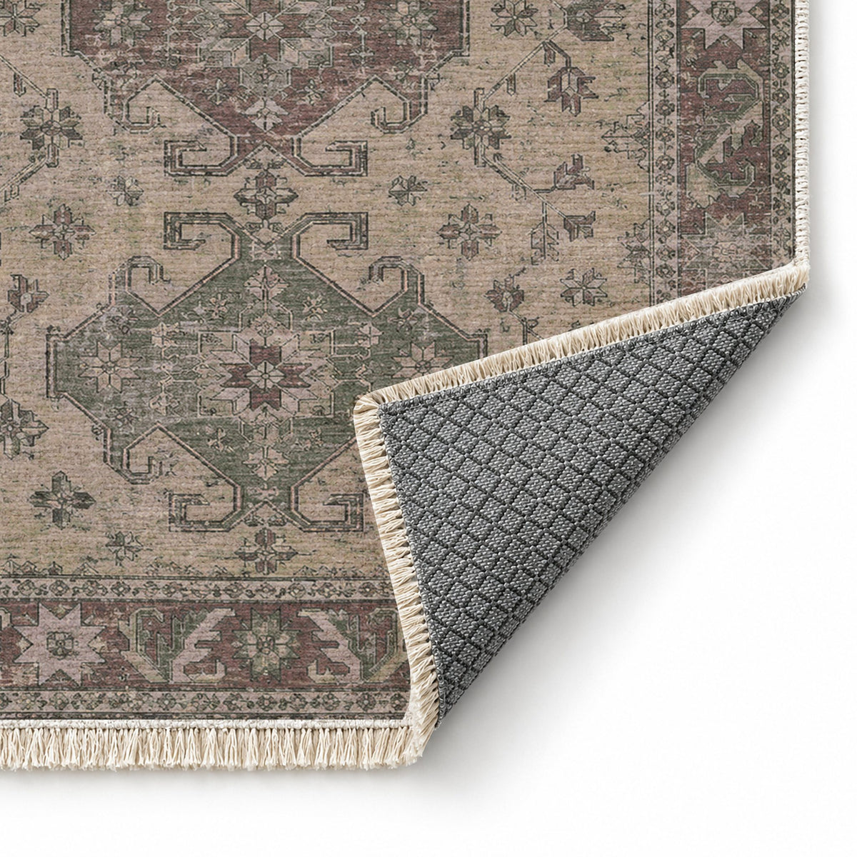 Hooked Shield Graphite & Linen washable rug folded corner showing the backing