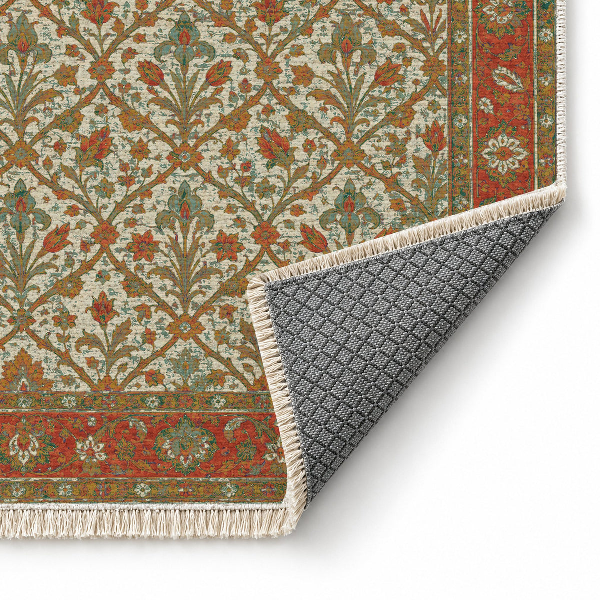 Iris Treasury Emerald & Terracotta washable rug folded corner showing the backing
