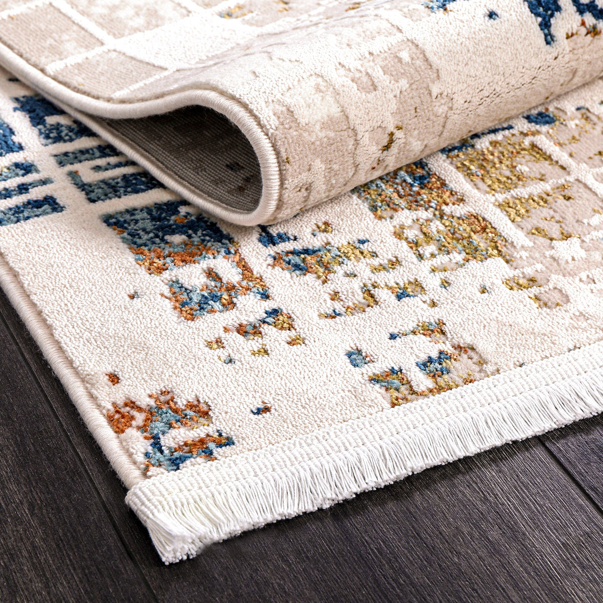 Ivory & Blue Distressed Abstract Area Rug pile close-up