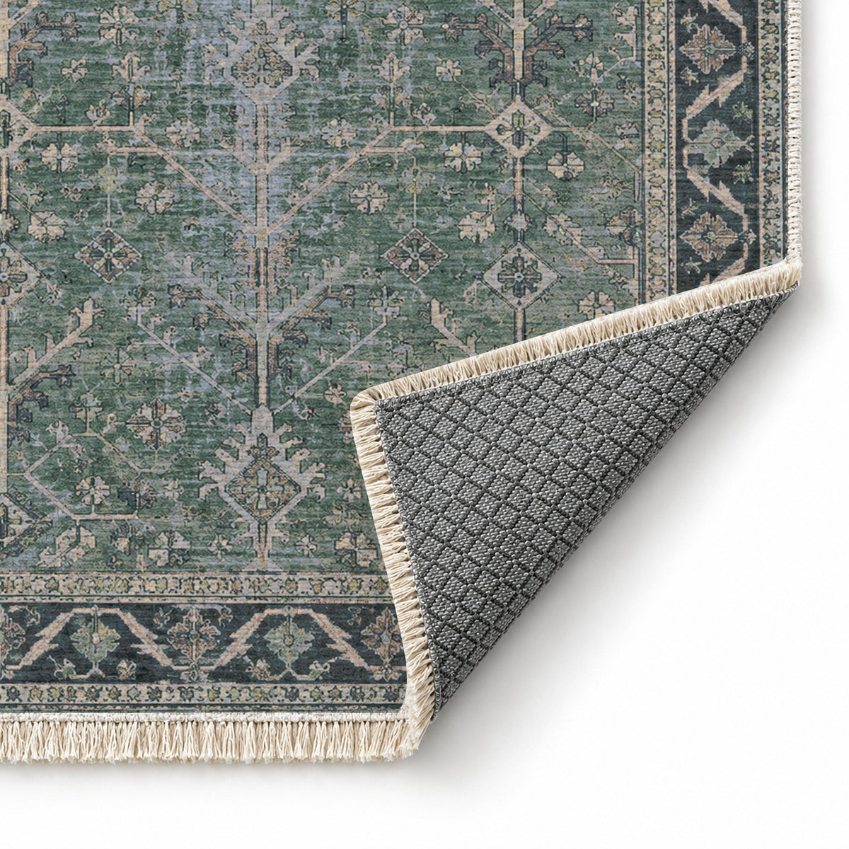 Konya Branch Mineral Blue washable rug folded corner showing the backing