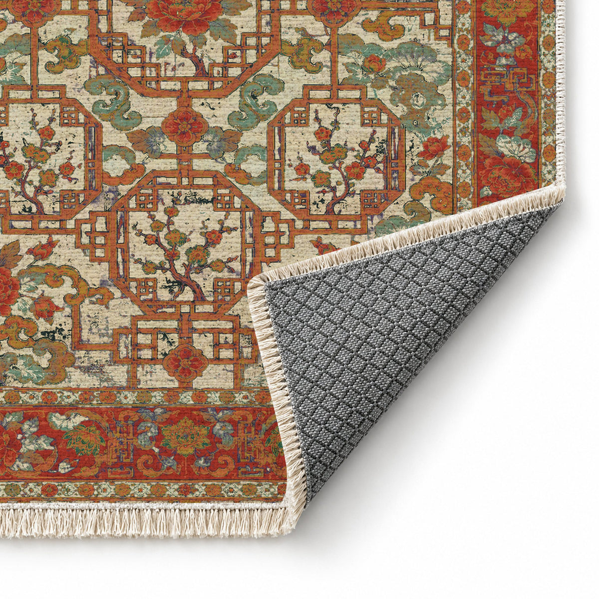 Lattice Gate Emerald & Terracotta washable rug folded corner showing the backing