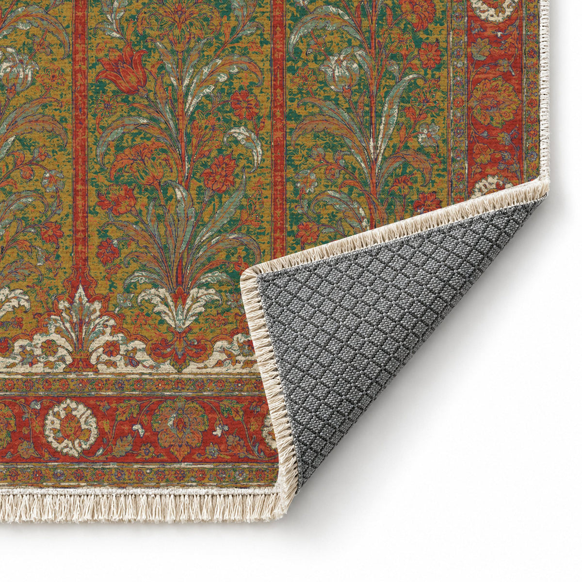 Lily Niches Emerald & Terracotta washable rug folded corner showing the backing