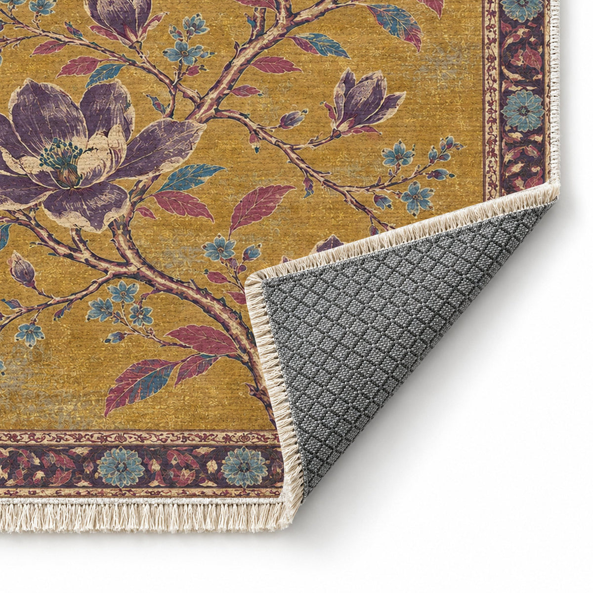 Magnolia Branch Crossing Golden, Plum & Azure washable rug folded corner showing the backing