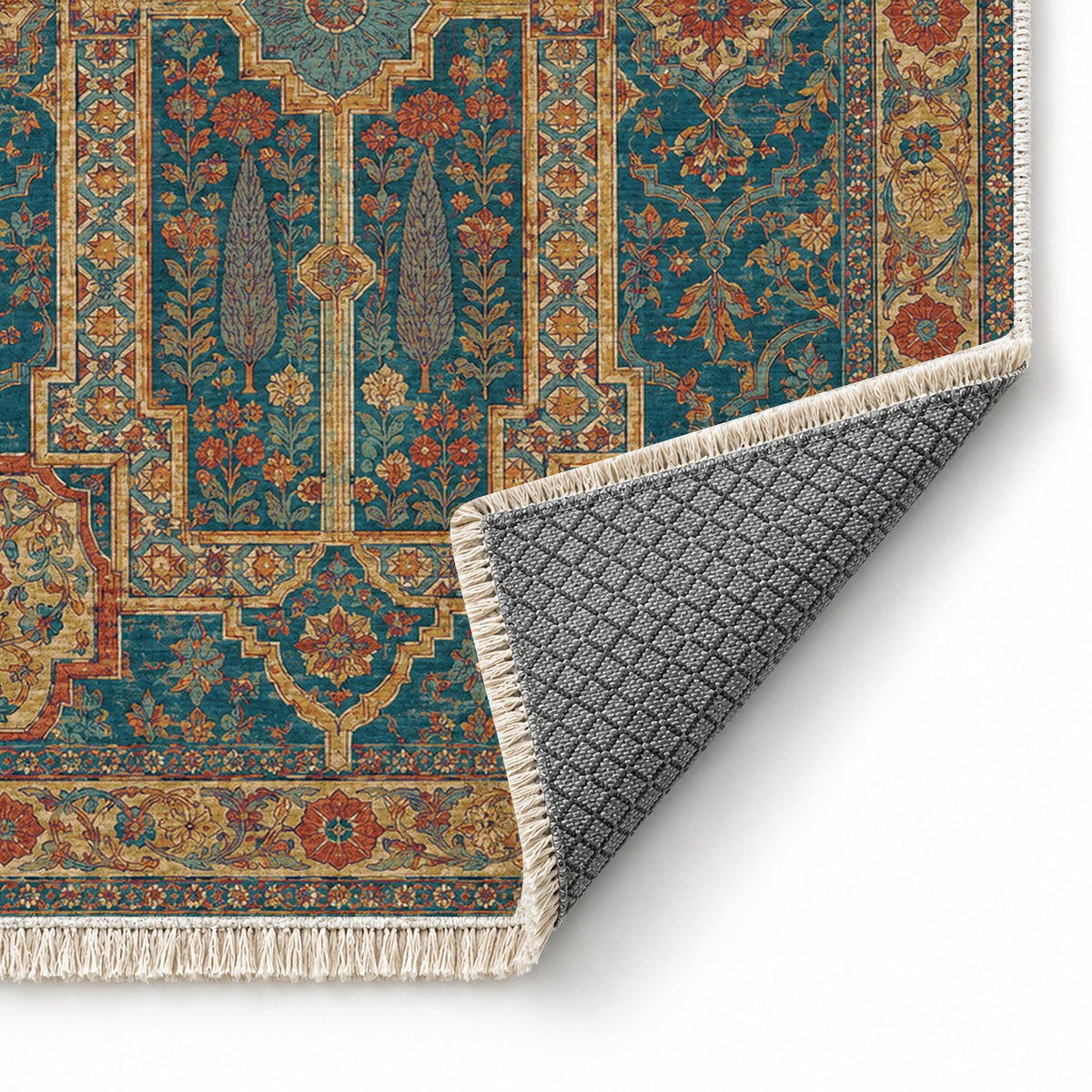 Maiden Courtyard Peacock & Ochre washable rug folded corner showing the backing