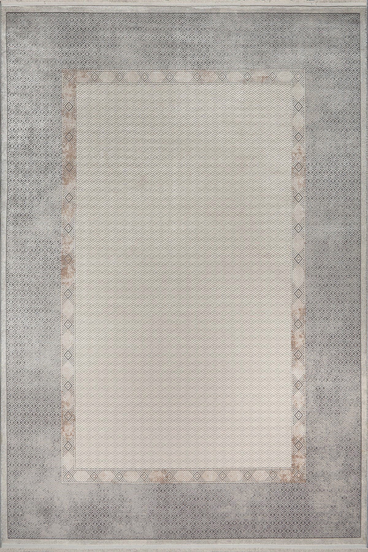 Rectangular area rug with a geometric pattern on a plain background