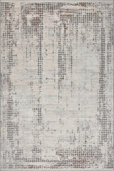 Textured area rug with a patterned design on a neutral background
