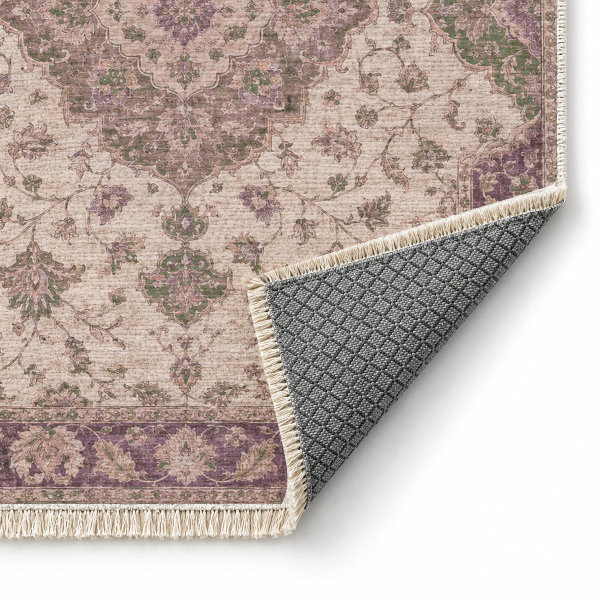 Medallion Reverie Rose & Olive washable rug folded corner showing the backing