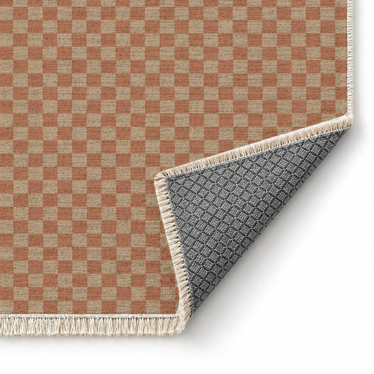 Micro Check Sand & Terracotta washable rug folded corner showing the backing