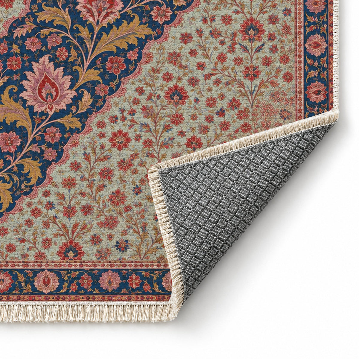 Millefleur Diagonal Reserve Glacier, Ink & Vermilion washable rug folded corner showing the backing