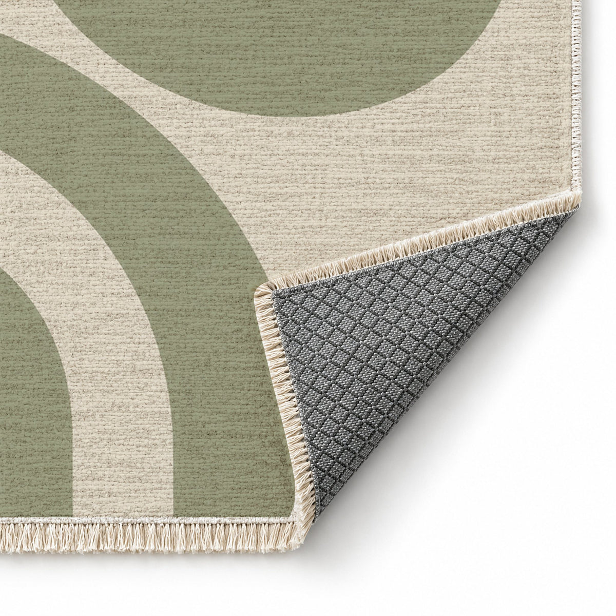 Nested Cove Ivory & Sage washable rug folded corner showing the backing