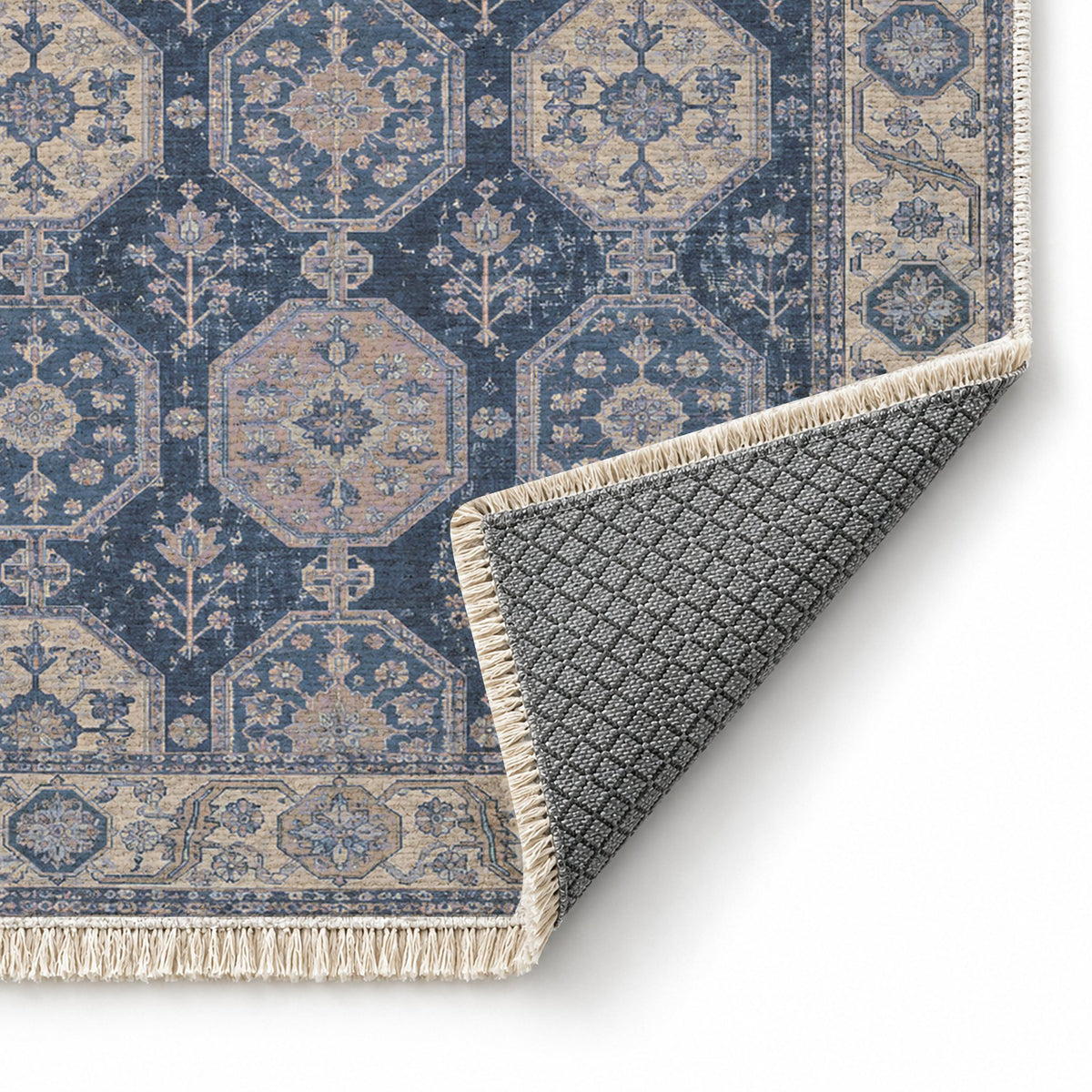 Octagon Towers Mineral Blue washable rug folded corner showing the backing