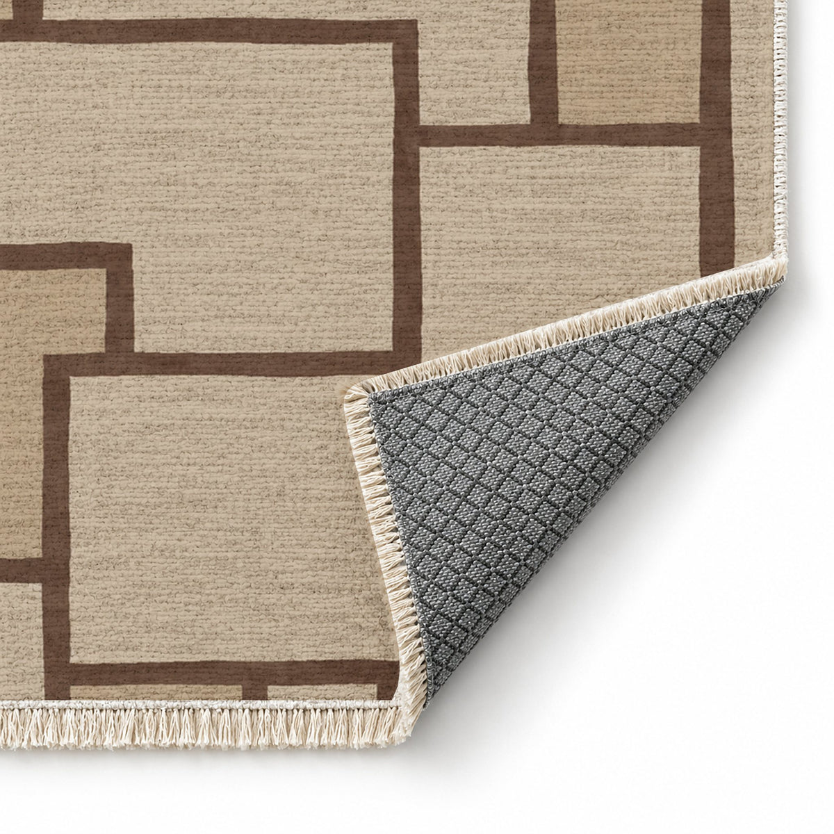 Offset Grid Oat & Cocoa washable rug folded corner showing the backing