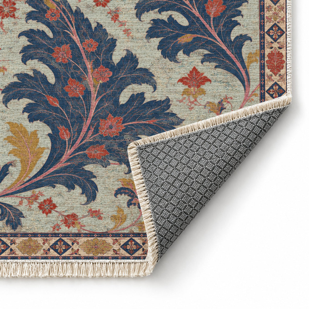 Open Arabesque Sails Glacier, Ink & Vermilion washable rug folded corner showing the backing
