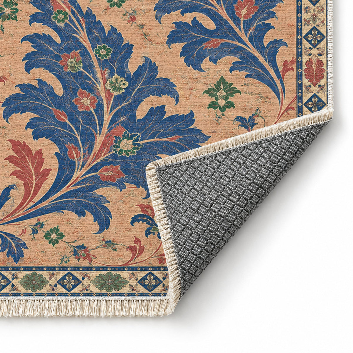 Open Arabesque Sails Peach, Cobalt & Jade washable rug folded corner showing the backing