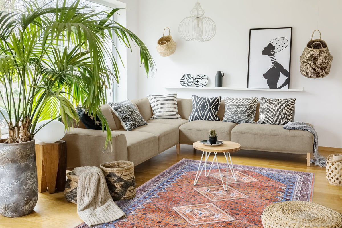 Orange & Blue Tribal Medallion Washable Rug in a living room