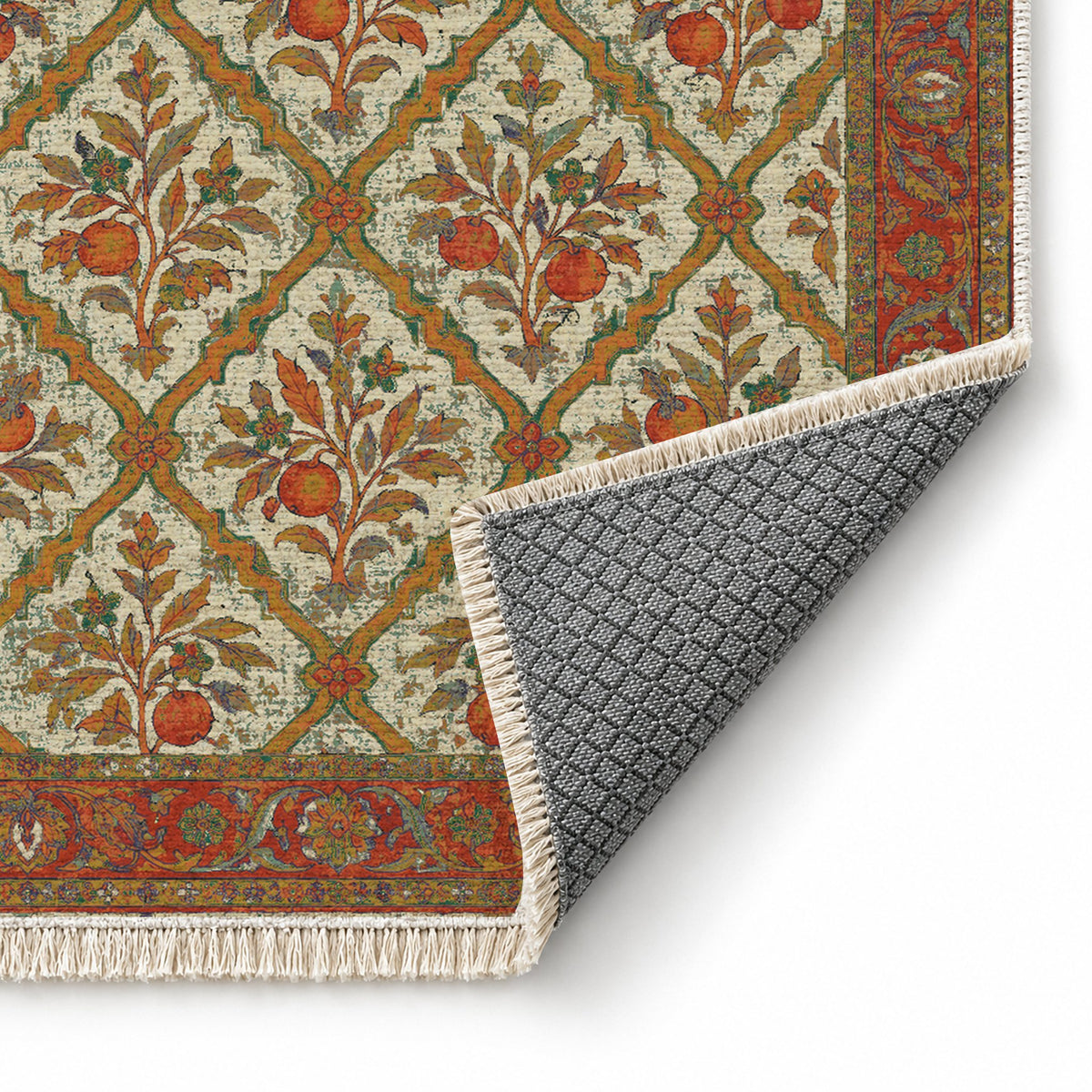 Orange Court Emerald & Terracotta washable rug folded corner showing the backing