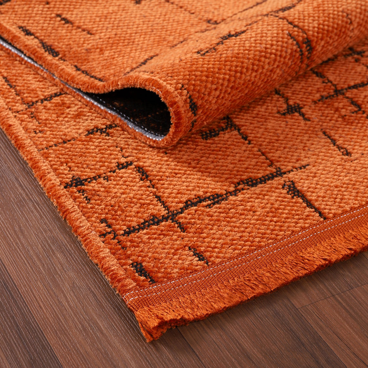 Orange Crosshatch Washable Rug pile close-up