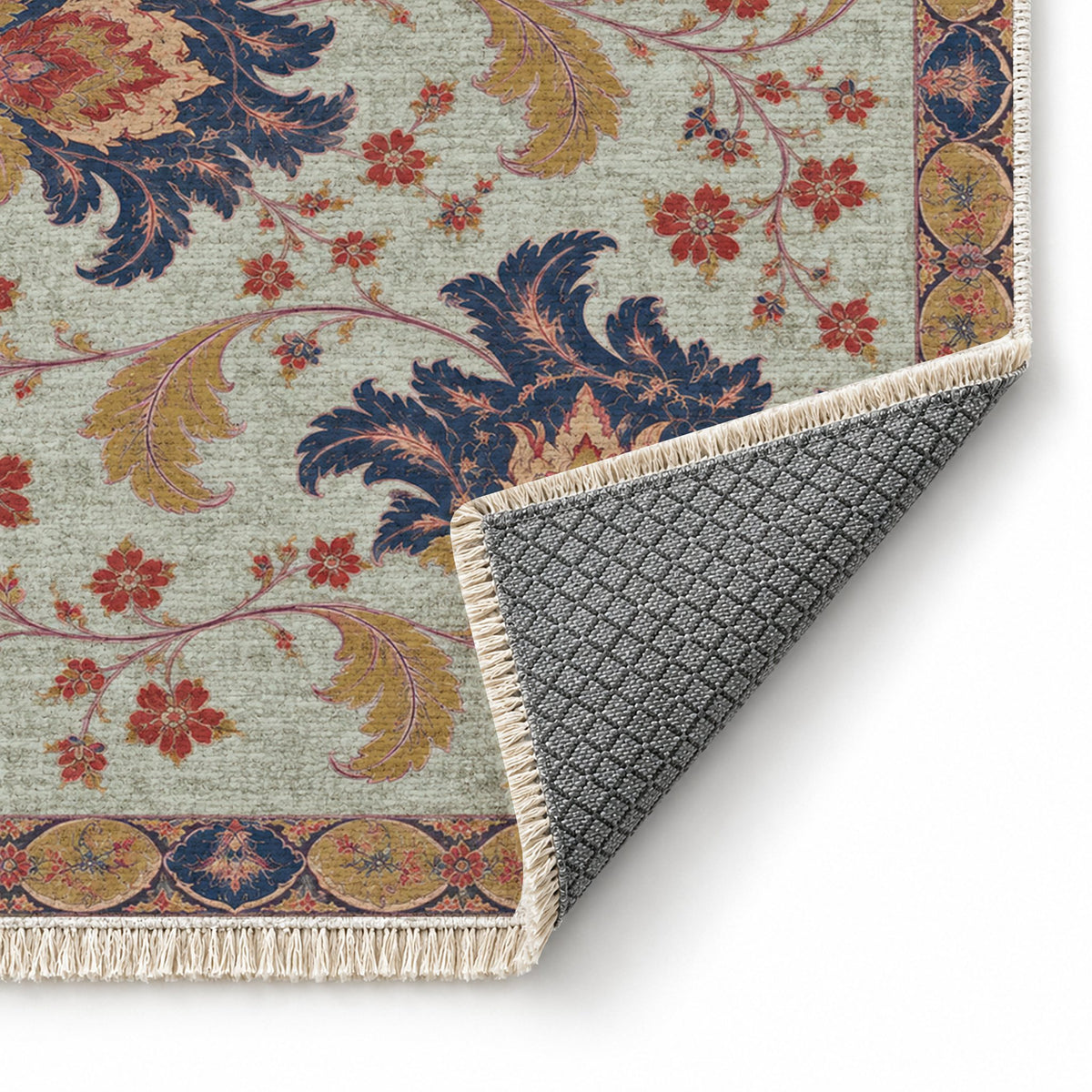 Palmette Crosscurrent Glacier, Ink & Vermilion washable rug folded corner showing the backing