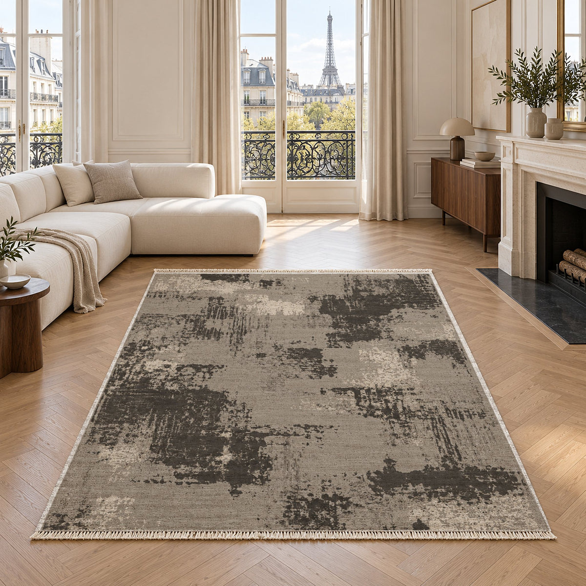 Patina Field Greige & Charcoal washable rug in a living room with an Eiffel Tower view