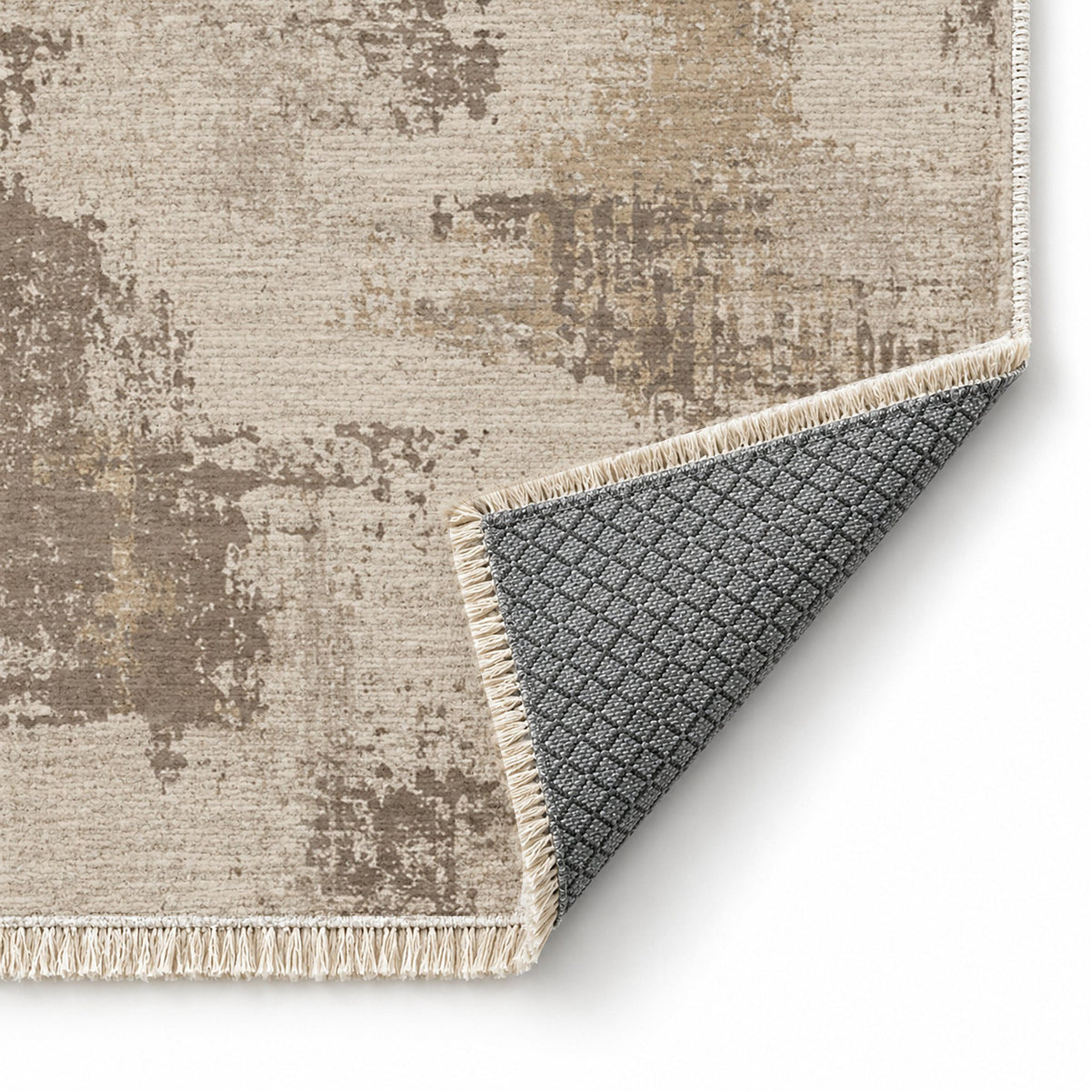 Patina Field Ivory & Taupe washable rug folded corner showing the backing