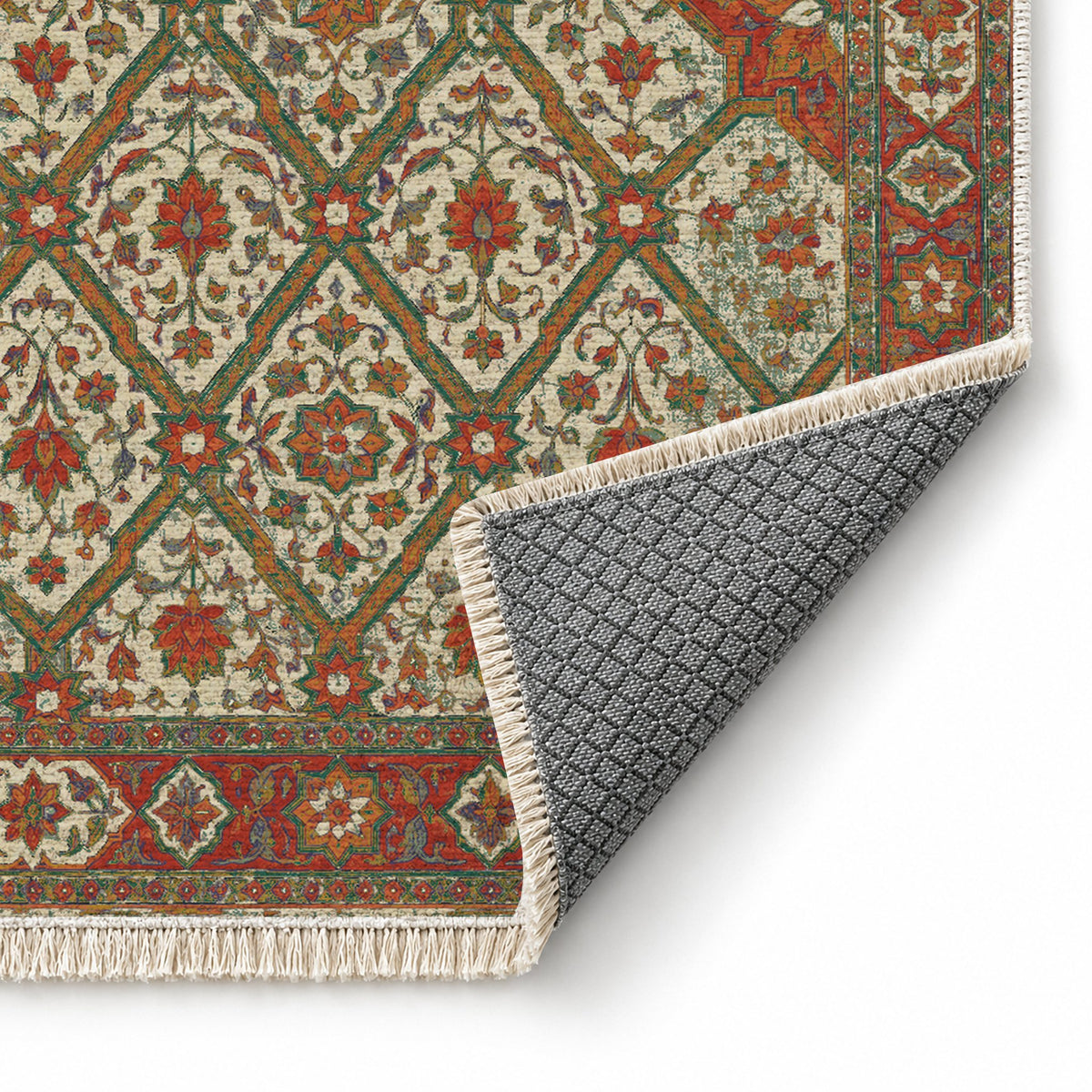 Patio Diamonds Emerald & Terracotta washable rug folded corner showing the backing