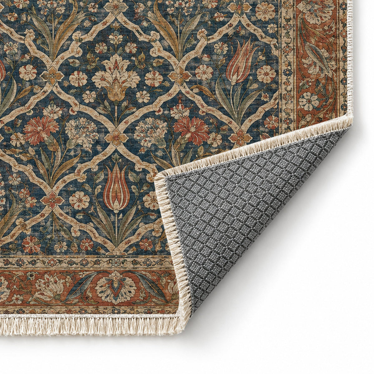 Pearl Door Indigo & Rust washable rug folded corner showing the backing