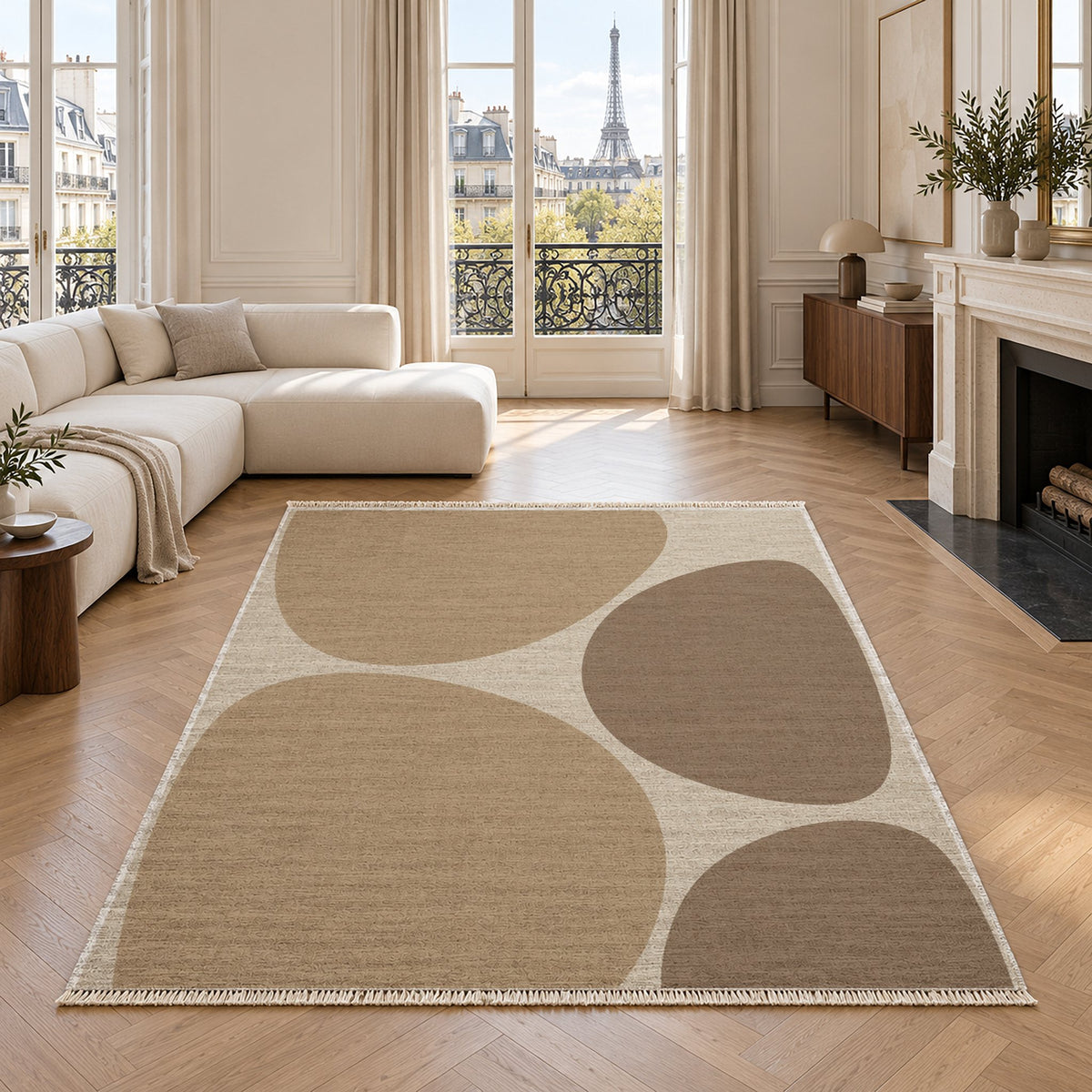 Pebble Forms Ivory & Sand washable rug in a living room with an Eiffel Tower view