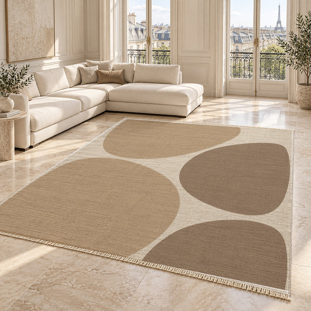 Pebble Forms Ivory & Sand washable rug angled room view on marble