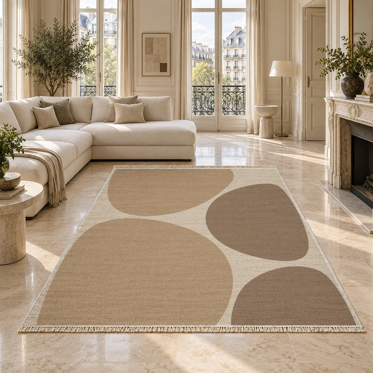Pebble Forms Ivory & Sand washable rug on a marble floor
