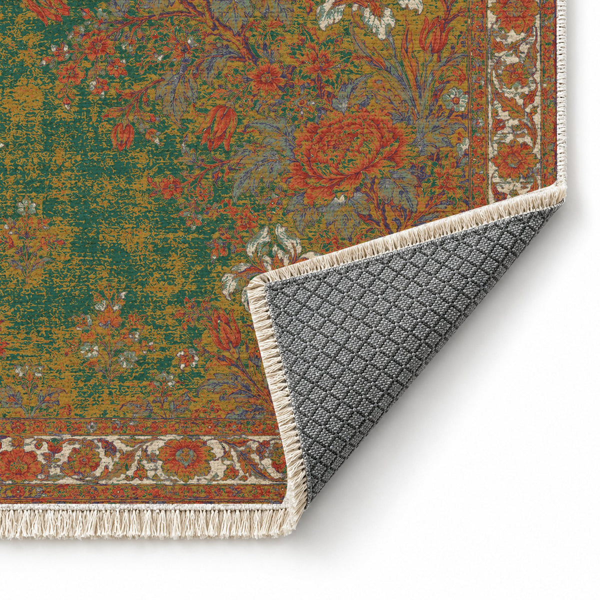 Peony Cascade Emerald & Terracotta washable rug folded corner showing the backing