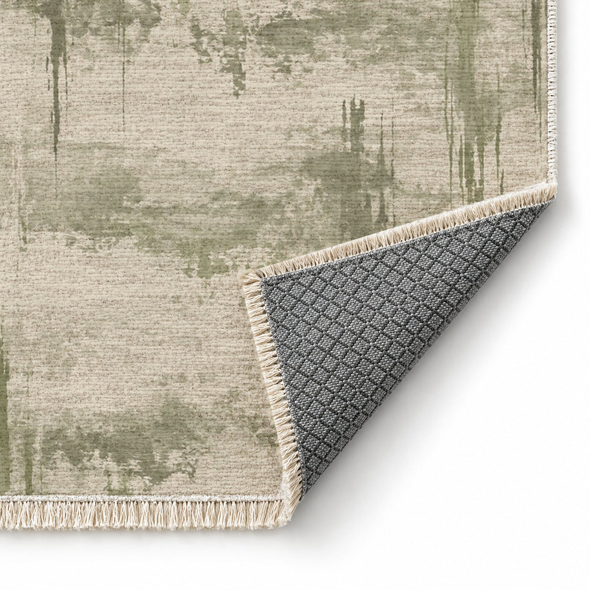 Pigment Rain Ivory & Sage washable rug folded corner showing the backing