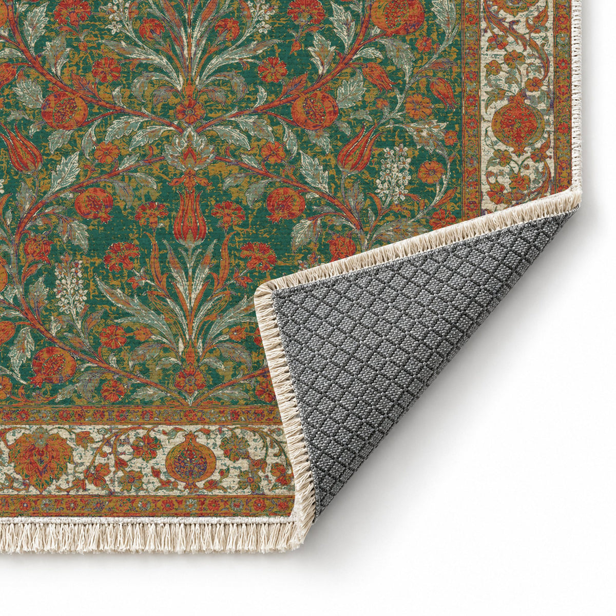 Pomegranate Court Emerald & Terracotta washable rug folded corner showing the backing