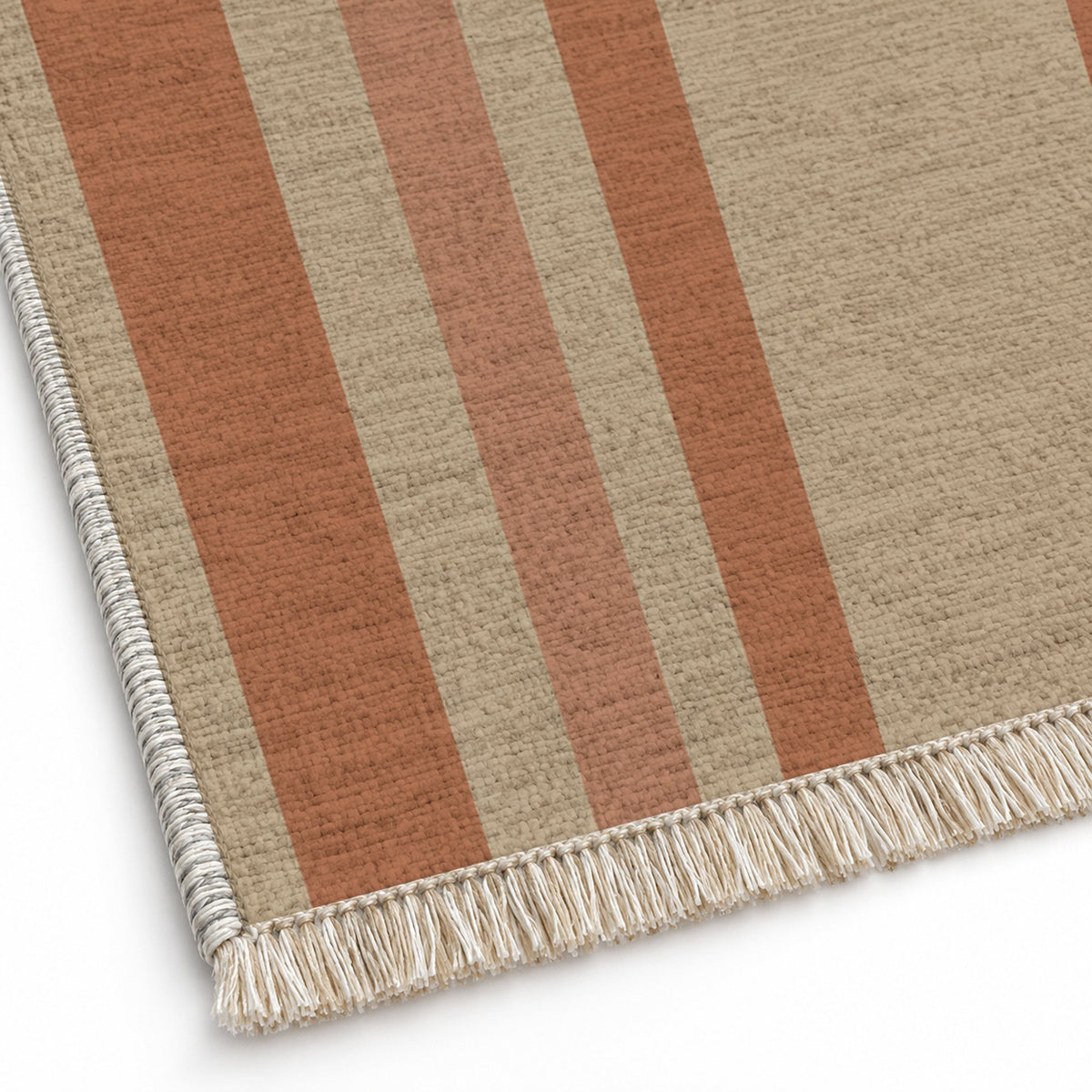 Quiet Arches Sand & Terracotta washable rug close-up of the printed chenille
