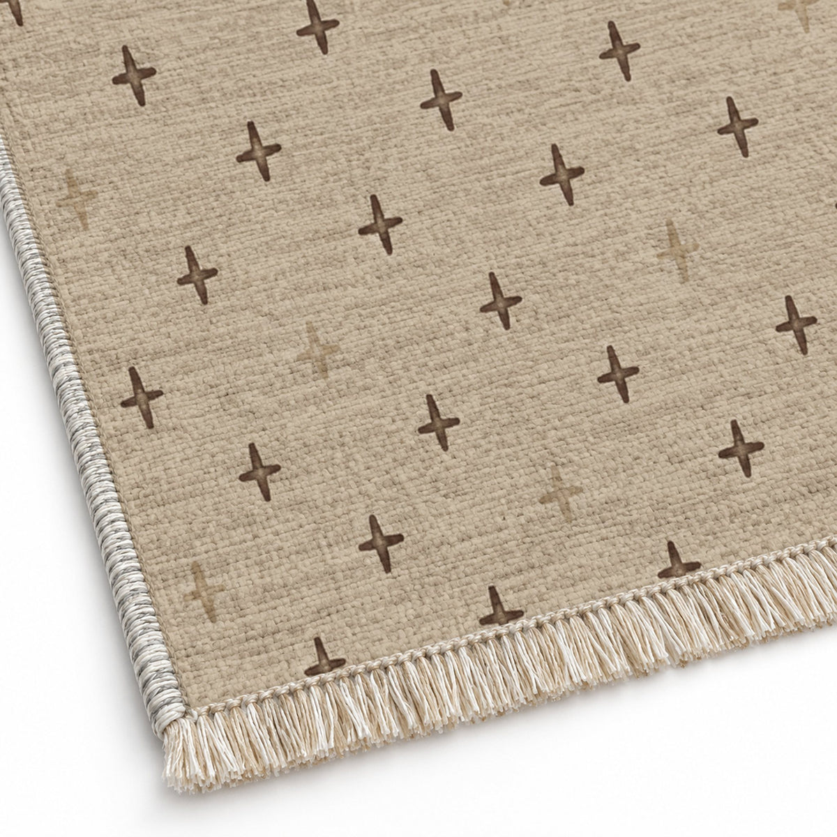 Quiet Crosses Oat & Cocoa washable rug close-up of the printed chenille