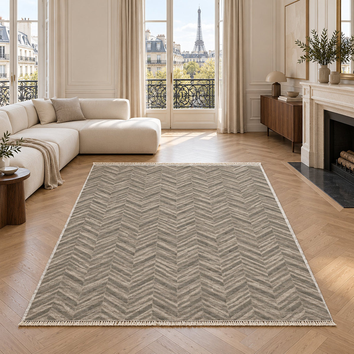Quiet Herringbone Greige & Stone washable rug in a living room with an Eiffel Tower view