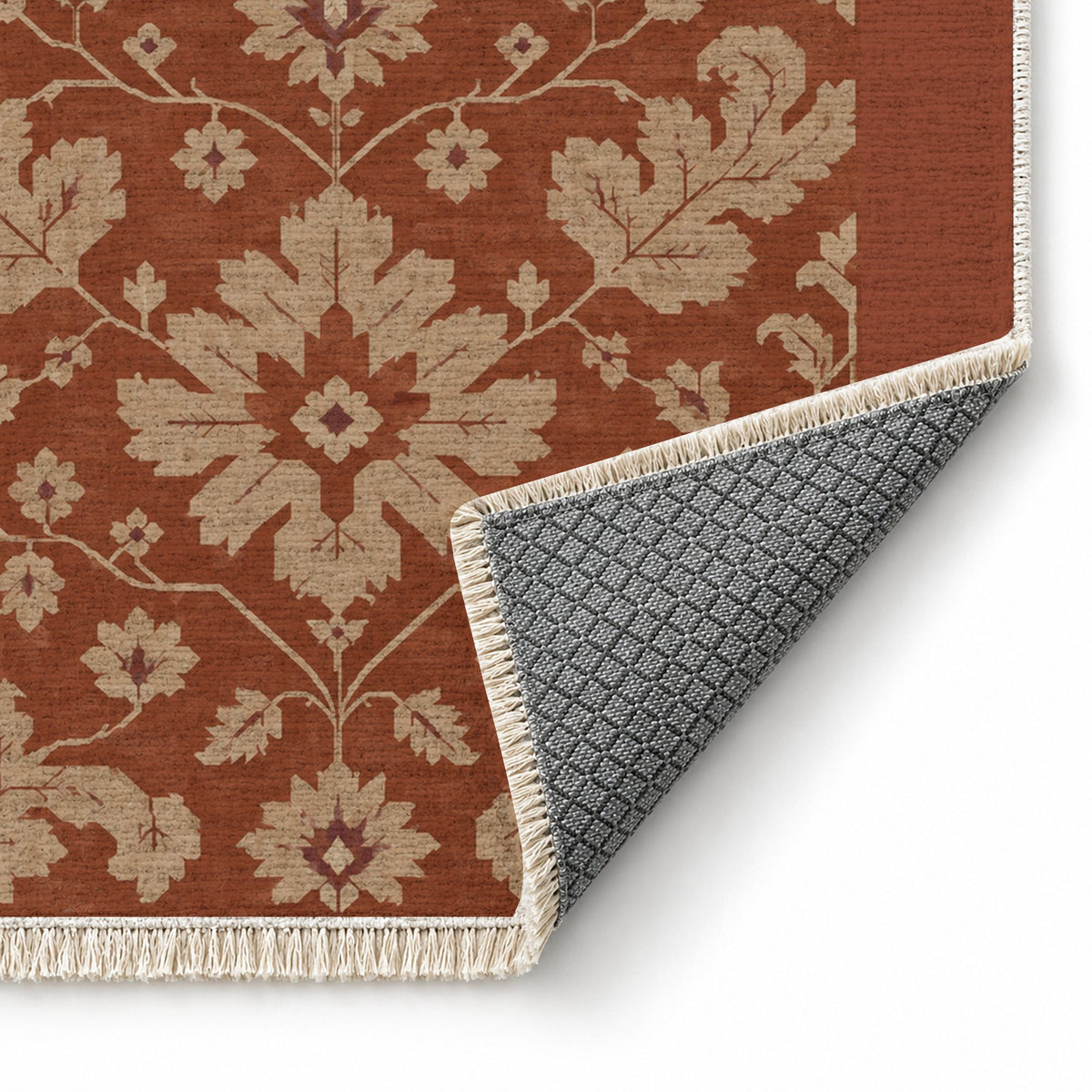 Quiet Oushak Rust & Sand washable rug folded corner showing the backing