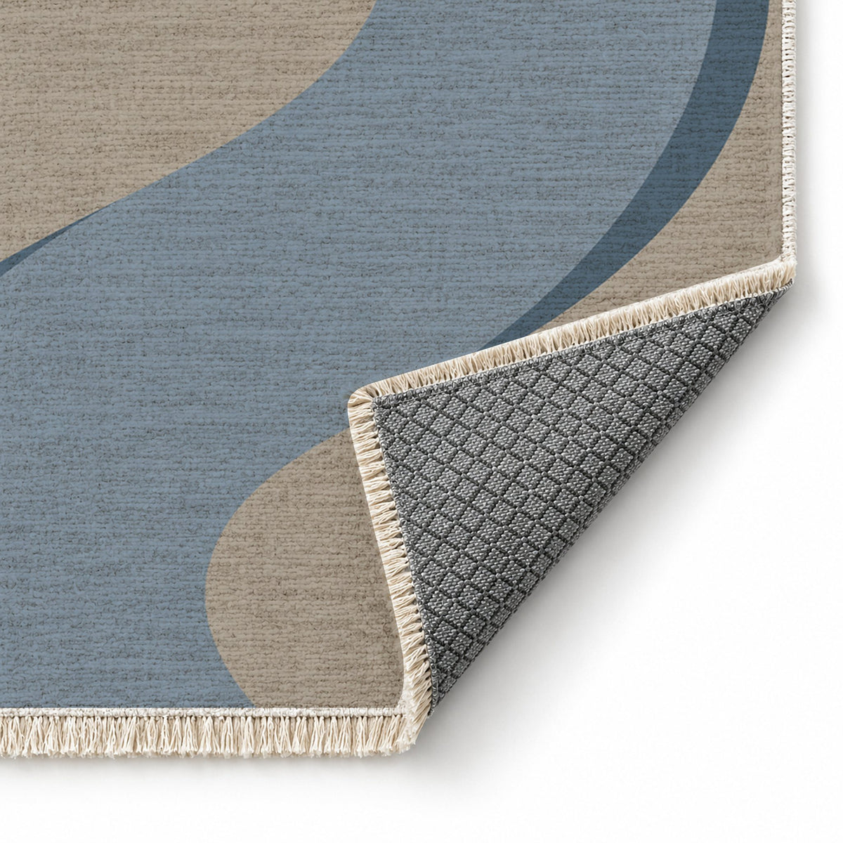Ribbon Curve Greige & Dusty Blue washable rug folded corner showing the backing