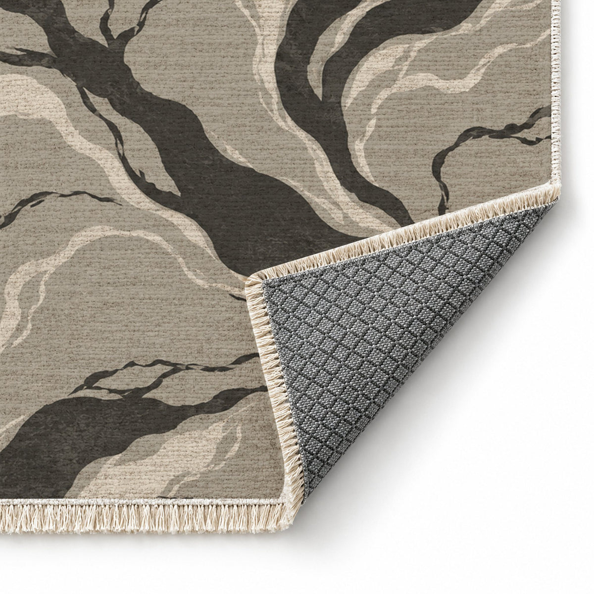 Riverbed Greige & Charcoal washable rug folded corner showing the backing